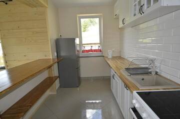 Фото номера Коттедж с 6 спальнями Дома для отпуска Solna Chata-Grota solna, Sauna, Basen г. Райча 16