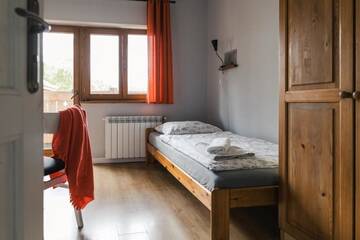 Фото номера Двухместный номер с 2 отдельными кроватями и балконом Отели типа «постель и завтрак» Gościniec Rajec г. Райча 4